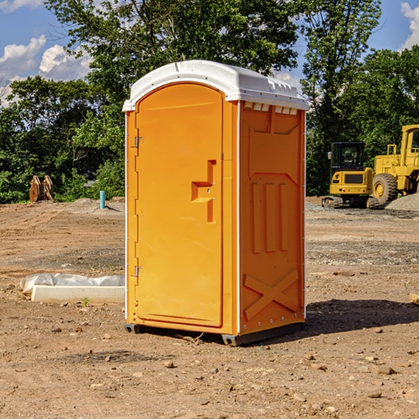 how often are the portable restrooms cleaned and serviced during a rental period in Adams Basin